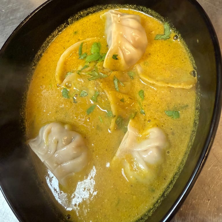 Savor Our Jhol Momo
